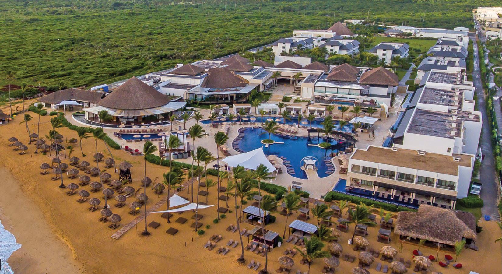 Aerial view of Royalton CHIC Punta Cana resort at golden hour